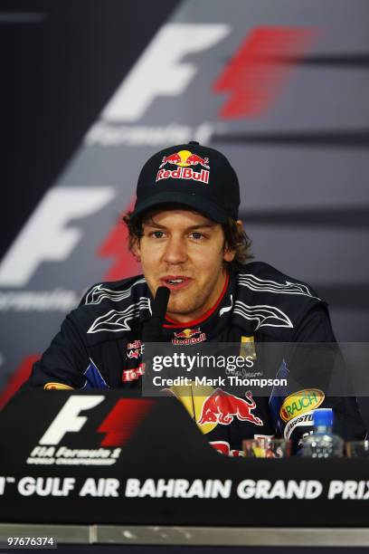 Pole sitter Sebastian Vettel of Germany and Red Bull Racing is seen in the drivers press conference following qualifying for the Bahrain Formula One...