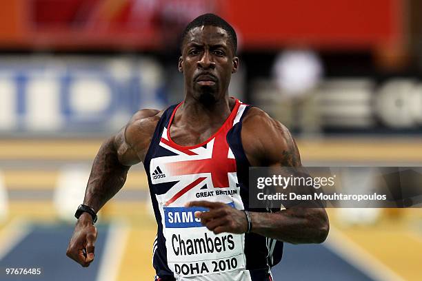 Dwain Chambers of Great Britain competes and wins the Mens 60m Semi Final during Day 2 of the IAAF World Indoor Championships at the Aspire Dome on...