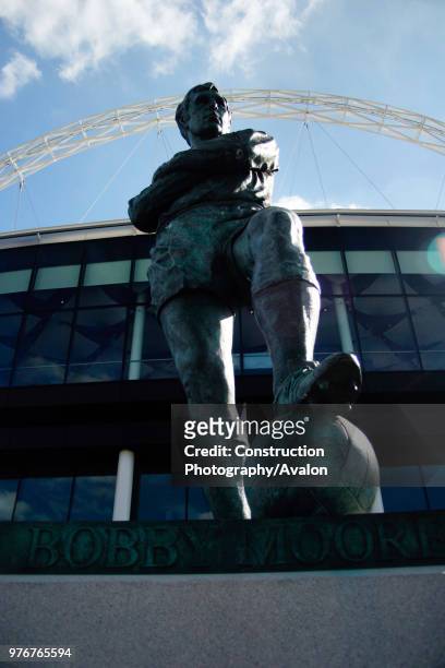 Statue of Bobby Moore outside Wembley Stadium. Wembley Stadium was designed by architects HOK Sport and Foster and Partners with Engineers Mott...