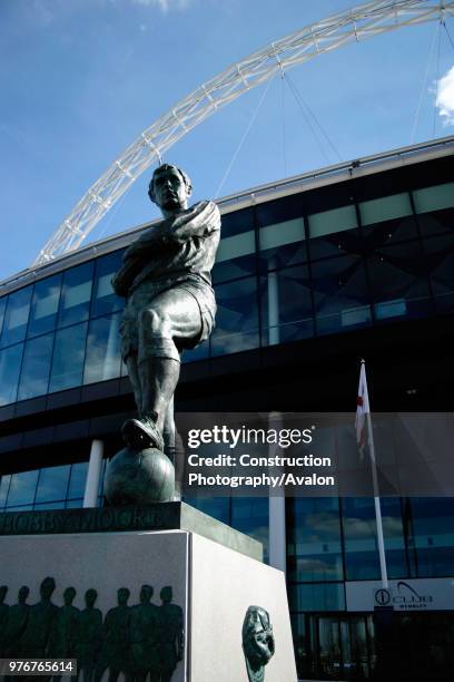 Statue of Bobby Moore outside Wembley Stadium. Wembley Stadium was designed by architects HOK Sport and Foster and Partners with Engineers Mott...