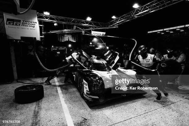 The Toyota Gazoo Racing TS050 Hybrid of Mike Conway, Kamui Kobayashi and Jose Maria Lopez comes in for a pitstop during the Le Mans 24 Hour race at...