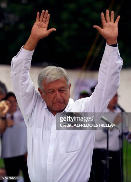 Mexican presidential candidate for the MORENA party, Andres Manuel Lopez Obrador, gestures to his supporters after a campaign rally in Cuernavaca,...