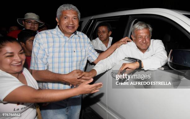 Mexican presidential candidate for the MORENA party, Andres Manuel Lopez Obrador, poses with supporters after a campaign rally on June 16, 2018 ahead...