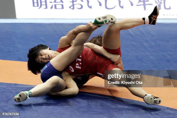 Yuki Irie competes against Kika Kagata in the Women's 50kg second round match on day four of the All Japan Wrestling Invitational Championships at...