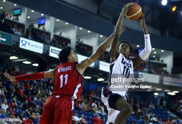 Quamdeen Dosunmu of the United States shoots the ball as Andrew Nembhard of Canada defends during the Gold Medal final of the FIBA U18 Americas...