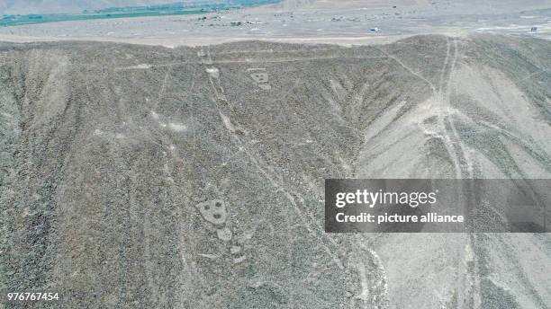 April 2018, Peru, Palpa: An aerial photograph of geometric figures and lines, as well as representations of animals and plants. The newly discovered...