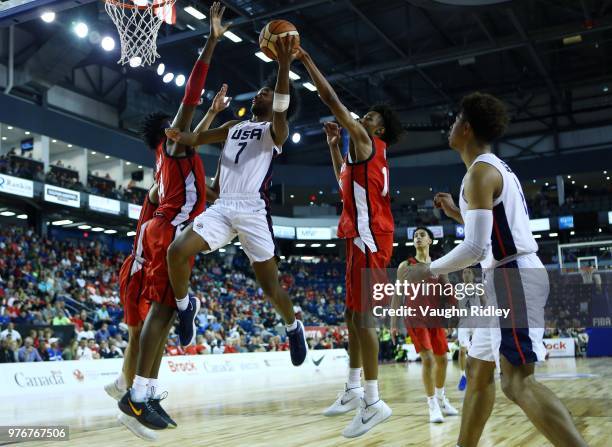 Alex White of the United States shoots the ball during the Gold Medal final of the FIBA U18 Americas Championship against Canada at the Meridian...