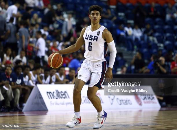 Quentin Grimes of the United States dribbles the ball during the Gold Medal final of the FIBA U18 Americas Championship against Canada at the...