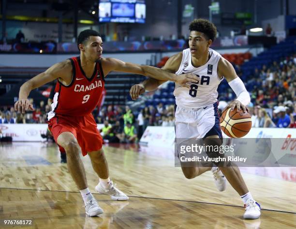 Quentin Grimes of the United States dribbles the ball as Addison Patterson of Canada defends during the Gold Medal final of the FIBA U18 Americas...