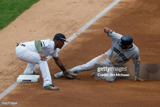 Miguel Andujar of the New York Yankees in action against Marwin Gonzalez of the Houston Astros at Yankee Stadium on May 28, 2018 in the Bronx borough...