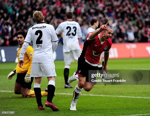 Leon Andreasen of Hannover celebrates scoring his teams first goal during the Bundesliga match between Hannover 96 and Eintracht Frankfurt at...