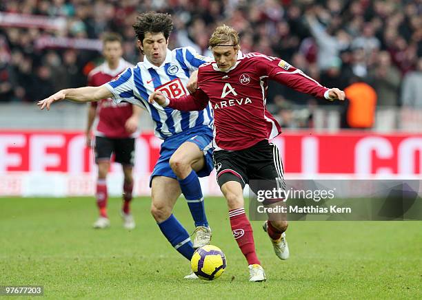 Levan Kobiashvili of Berlin battles for the ball with Marcel Risse of Nuernberg during the Bundesliga match between Hertha BSC Berlin and 1.FC...