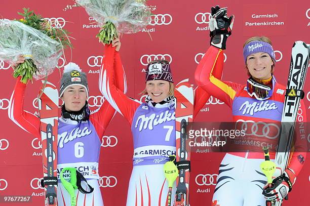 Race winners Second placed Austria's Kathrin Zettel, winner Austria's Marlies Schild, and third placed Germany's Maria Riesch pose in the finish area...