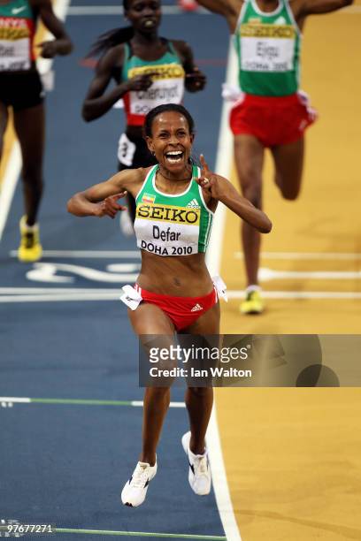 Meseret Defar of Ethiopia celebrates winning the gold medal in the Womens 3000m during Day 2 of the IAAF World Indoor Championships at the Aspire...