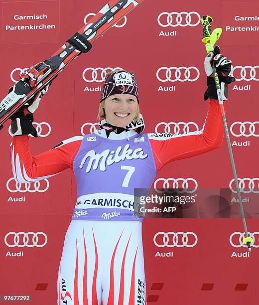 Slalom winner Austria's Marlies Schild poses in the finish area after the women's Alpine skiing World Cup Slalom finals in Garmisch Partenkirchen,...