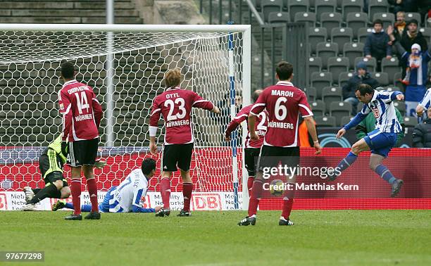 Theofanis Gekas of Berlin scores his team's first goal during the Bundesliga match between Hertha BSC Berlin and 1.FC Nuernberg at Olympic Stadium on...