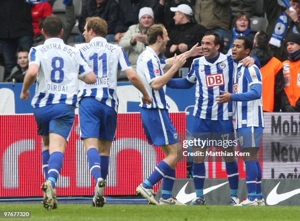 Theofanis Gekas of Berlin celebrates with team mates after scoring his team's first goal during the Bundesliga match between Hertha BSC Berlin and...