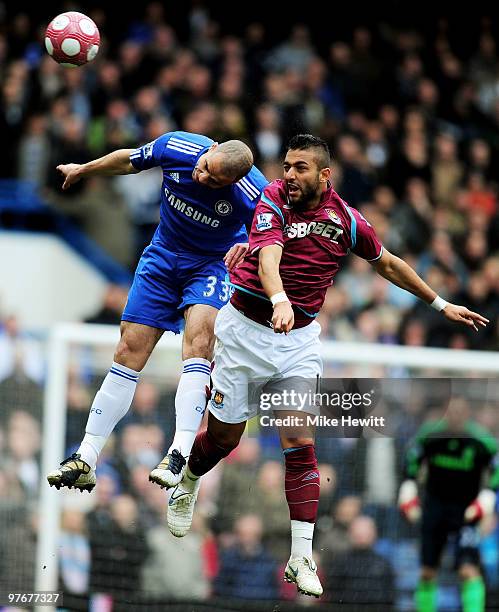 Alex of Chelsea and Mido of West Ham compete for a header during the Barclays Premier League match between Chelsea and West Ham United at Stamford...