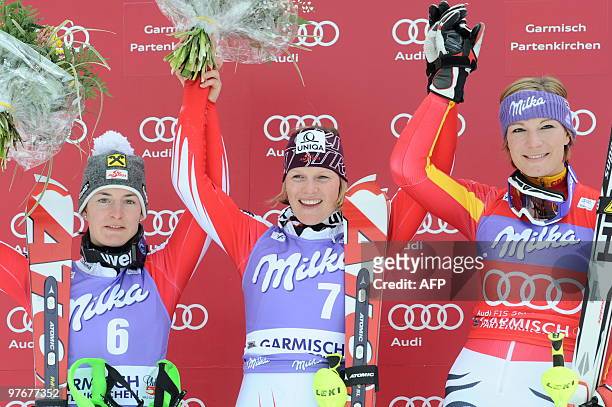 Race winners Second placed Austria's Kathrin Zettel, winner Austria's Marlies Schild, and third placed Germany's Maria Riesch pose in the finish area...