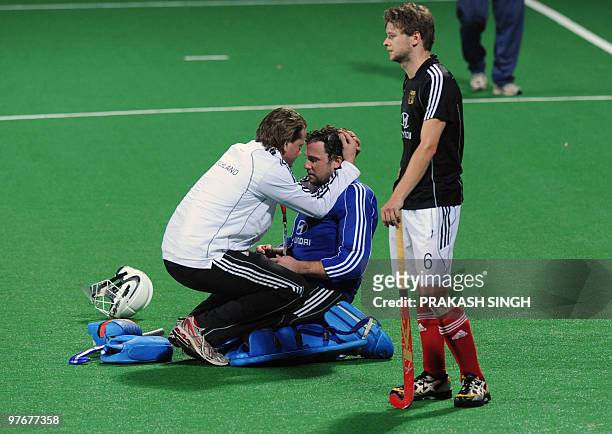 German hockey player Martin Häner Tim Jessulat look dejected after their World Cup 2010 final match against Australia at the Major Dhyan Chand...