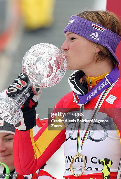 Maria Riesch of Germany takes the globe for the overall World Cup Slalom during the Audi FIS Alpine Ski World Cup Women's Slalom on March 13, 2010 in...