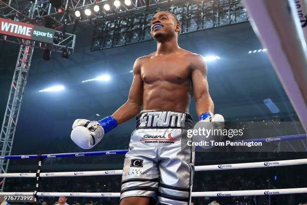 Errol Spence Jr. Reacts after knocking out Carlos Ocampo in the first round of a IBF Welterweight Championship bout at The Ford Center at The Star on...