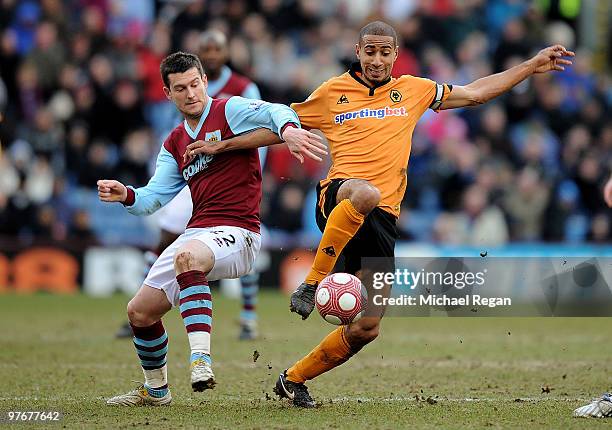 Chris Eagles of Burnley is tackled by Karl Henry of Wolverhampton during the Barclays Premier League match between Burnley and Wolverhampton...