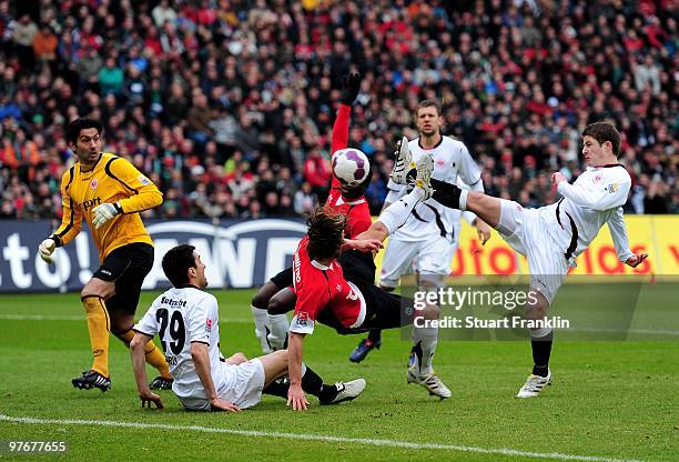 Christian Schulz of Hannover attemps an overhead kick during the Bundesliga match between Hannover 96 and Eintracht Frankfurt at AWD-Arena on March...