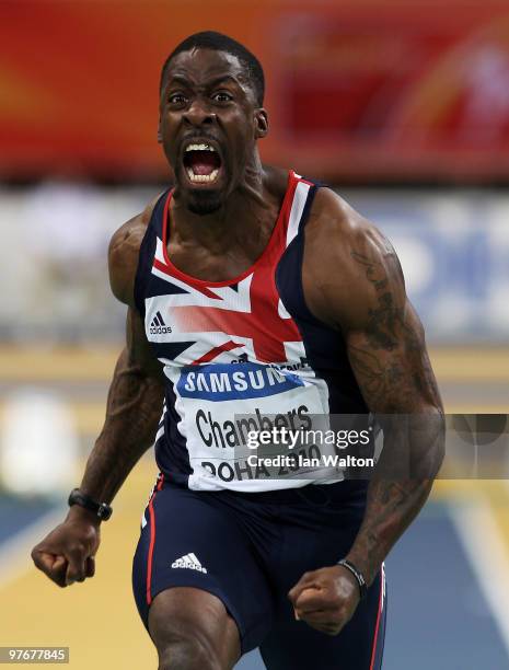 Dwain Chambers of Great Britain celebrates winning Gold in the Mens 60m Final during Day 2 of the IAAF World Indoor Championships at the Aspire Dome...