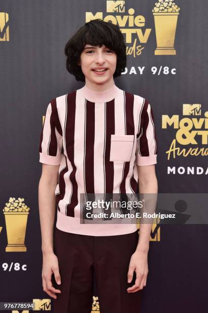 Actor Finn Wolfhard attends the 2018 MTV Movie And TV Awards at Barker Hangar on June 16, 2018 in Santa Monica, California.