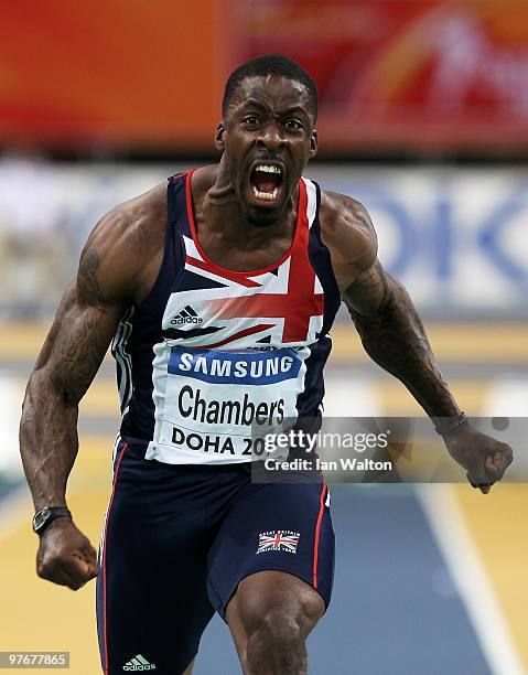 Dwain Chambers of Great Britain celebrates winning Gold in the Mens 60m Final during Day 2 of the IAAF World Indoor Championships at the Aspire Dome...