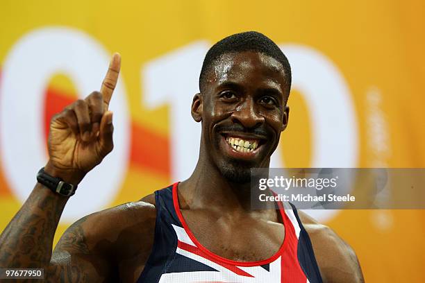Dwain Chambers of Great Britain celebrates winning Gold in the Mens 60m Final during Day 2 of the IAAF World Indoor Championships at the Aspire Dome...