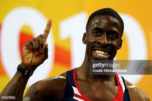 Dwain Chambers of Great Britain celebrates winning Gold in the Mens 60m Final during Day 2 of the IAAF World Indoor Championships at the Aspire Dome...