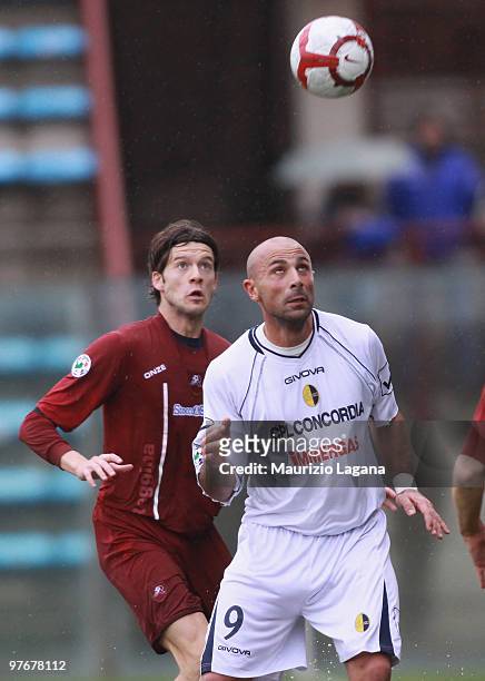Andrea Costa of Reggina Calcio battles for the ball with Salvatore Bruno of Modena FC during the Serie B match between Reggina Calcio and Modena FC...
