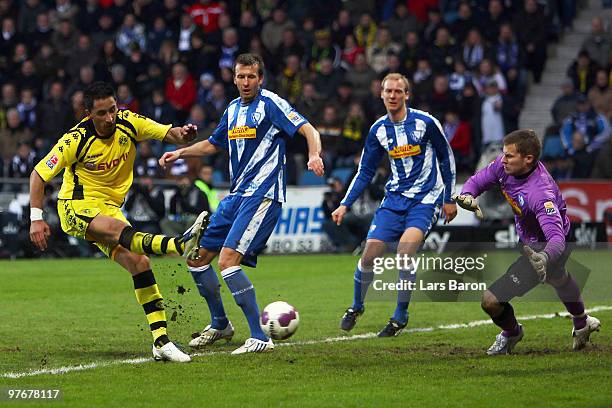 Lucas Barrios of Dortmund scores his teams fourth goal during the Bundesliga match between VfL Bochum and Borussia Dortmund at Rewirpower Stadium on...
