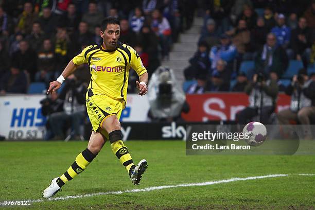 Lucas Barrios of Dortmund scores his teams third goal during the Bundesliga match between VfL Bochum and Borussia Dortmund at Rewirpower Stadium on...
