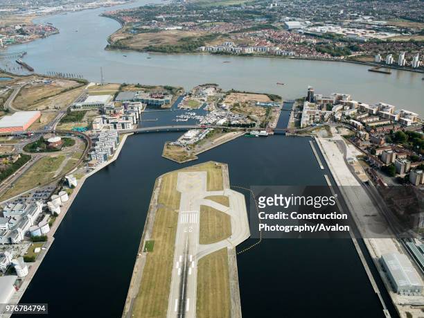 Aerial view City Airport from the east. Old Royal Docks, University of East London, Thames Barrier and Excel.