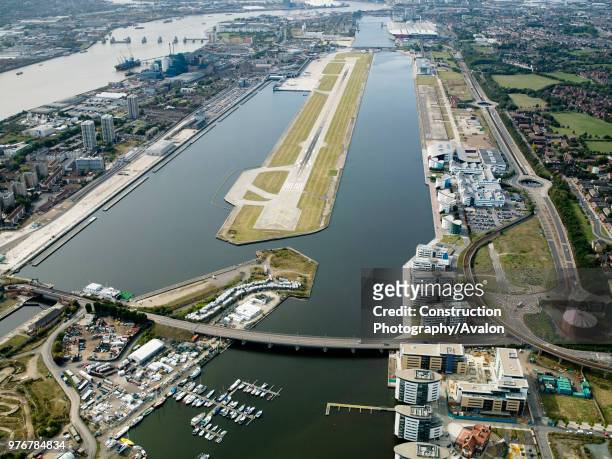 Aerial view City Airport from the east. Old Royal Docks, University of East London, Thames Barrier and Excel exhibition Centre.