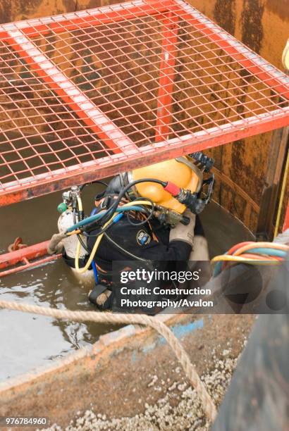 The 2 temp piers had to be cut at river bed level by Divers, this was a tuff job as visibility was poor and the confined space.