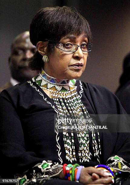 Winnie Madikizela Mandela, the former wife of South African former President Nelson Mandela looks on during the funeral of anti apartheid stalwart...