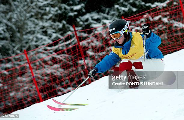 Canada*s Jennifer Heil in action during women's dual moguls freestyle World Cup in Are, Sweden on March 13, 2010. Kearney won the race. AFP...