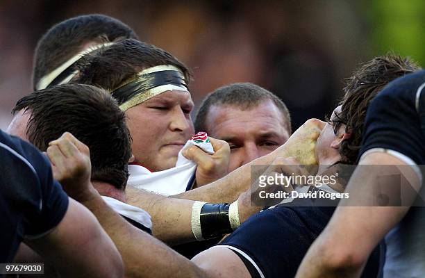 Dylan Hartley of England throws a punch at Ross Ford of Scotland during the RBS Six Nations Championship match between Scotland and England at...