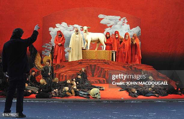 Director Christian Stueckl rehearses one of the many living tableaux in the Oberammergau Passion play in Oberammergau March 9, 2010. Once every 10...