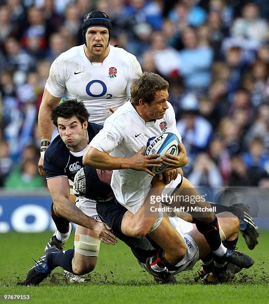 Graeme Morrison of Scotland tackles Jonny Wilkinson of England during the RBS Six Nations match between Scotland and England at Murrayfield Stadium...
