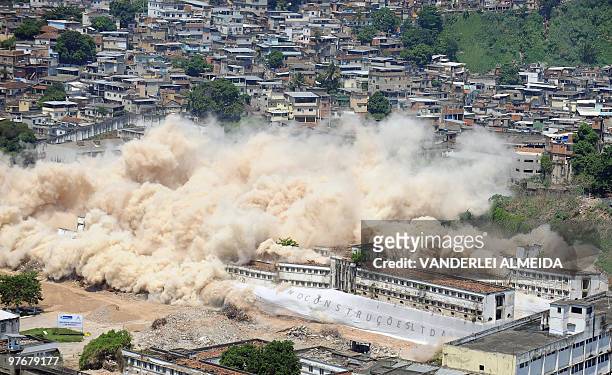 General view of the implosion of the Frei Caneca prison, located in the shantytown area of the Estacio neighbourhood in Rio de Janeiro, on March 13,...