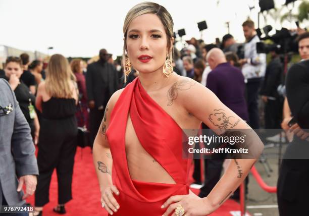 Singer Halsey attends the 2018 MTV Movie And TV Awards at Barker Hangar on June 16, 2018 in Santa Monica, California.