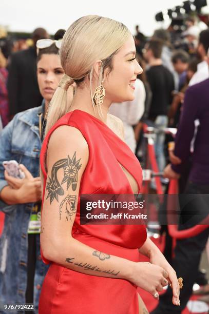 Singer Halsey attends the 2018 MTV Movie And TV Awards at Barker Hangar on June 16, 2018 in Santa Monica, California.