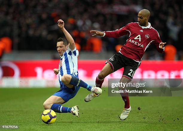 Pal Dardai of Berlin battles for the ball with Mickael Tavares of Nuernberg during the Bundesliga match between Hertha BSC Berlin and 1.FC Nuernberg...