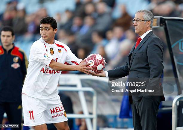 Coach Gregorio Manzano of Mallorca gives the ball to his player Gonzalo Castro during the La Liga match between Getafe and Mallorca at Coliseum...