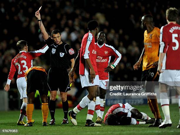 George Boateng of Hull City is sent off for a challenge on Bacary Sagna of Arsenal during the Barclays Premier League match between Hull City and...